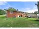 Back of the house, showing a large backyard and detached garage at 117 Bolding St, Gastonia, NC 28052
