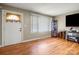 Living room with hardwood floors and large windows at 117 Bolding St, Gastonia, NC 28052