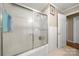 Bathroom with a glass-enclosed shower and tiled walls at 117 Bolding St, Gastonia, NC 28052