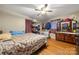 Bedroom featuring hardwood floors and ceiling fan at 117 Bolding St, Gastonia, NC 28052