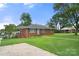 Brick ranch home with a spacious yard and driveway at 117 Bolding St, Gastonia, NC 28052