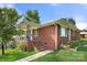 Side view of a brick ranch house showcasing its brick exterior at 117 Bolding St, Gastonia, NC 28052