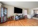 Spacious living room with hardwood floors and flat-screen TV at 117 Bolding St, Gastonia, NC 28052