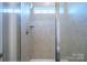 Clean shower with glass enclosure and tiled walls at 5013 Patton Dr, Gastonia, NC 28056