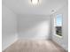 Simple bedroom with neutral carpeting and a window at 225 English Arbor Dr # 13, Fort Mill, SC 29715