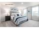 Spacious bedroom with large bed and neutral decor at 165 Basildon St # 1011, Lancaster, SC 29720