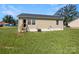 Large backyard with green grass and a wooden deck at 333 Irwin St, Rock Hill, SC 29730