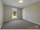 Spacious bedroom with grey carpet and an exterior door at 333 Irwin St, Rock Hill, SC 29730