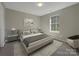 Primary bedroom with a king-size bed and neutral decor at 333 Irwin St, Rock Hill, SC 29730