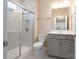 Bathroom with shower, toilet and gray vanity at 3087 Bartlett St, Fort Mill, SC 29715