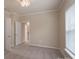 Spacious bedroom with neutral carpeting and access to a bathroom at 3087 Bartlett St, Fort Mill, SC 29715