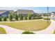 Curving sidewalks wind through a well-maintained neighborhood green space at 3087 Bartlett St, Fort Mill, SC 29715