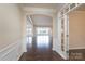 Bright entry hall with hardwood floors and views to the Gathering room at 3087 Bartlett St, Fort Mill, SC 29715