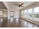Sunroom with hardwood floors, multiple windows, and a ceiling fan at 3087 Bartlett St, Fort Mill, SC 29715