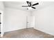 Spacious bedroom with ceiling fan and carpet flooring at 920 Holmes St, Salisbury, NC 28144