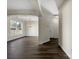 Bright dining room with dark hardwood floors and a chandelier at 3309 Paxton Ridge Dr, Indian Trail, NC 28079