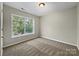 Spacious bedroom with neutral walls and carpet flooring at 3309 Paxton Ridge Dr, Indian Trail, NC 28079