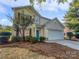 House exterior with landscaping and driveway at 3309 Paxton Ridge Dr, Indian Trail, NC 28079