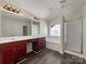 Bathroom boasts double vanity, soaking tub, and shower at 3309 Paxton Ridge Dr, Indian Trail, NC 28079