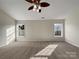 Large main bedroom with ceiling fan and carpet flooring at 3309 Paxton Ridge Dr, Indian Trail, NC 28079