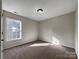 Simple bedroom with a window and carpet at 3309 Paxton Ridge Dr, Indian Trail, NC 28079