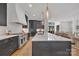Modern kitchen with stainless steel appliances and custom cabinetry at 3500 Barclay Downs Dr, Charlotte, NC 28209