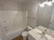 Bathroom with tub, vanity, and updated fixtures at 4432 Eaves Ln, Charlotte, NC 28215