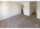 Spacious bedroom with neutral carpeting and access to hallway and bath at 4432 Eaves Ln, Charlotte, NC 28215