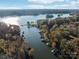 Lakefront property with several houses and boats visible at 151 River Ridge Ln, Statesville, NC 28677