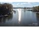 Aerial view of calm lake with houses and docks at 151 River Ridge Ln, Statesville, NC 28677