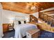 Spacious main bedroom with lake view, built in shelves, and wood ceilings at 151 River Ridge Ln, Statesville, NC 28677