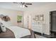 Main bedroom with dresser, ceiling fan, and access to a walk-in closet at 531 Tributary Dr # 26, Fort Lawn, SC 29714