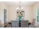 Dining room with a wooden table, wicker chairs, and a chandelier at 531 Tributary Dr # 26, Fort Lawn, SC 29714