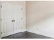 Empty bedroom with double door closet and dark hardwood floors at 531 Tributary Dr # 26, Fort Lawn, SC 29714