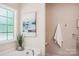 Clean bathroom with a window and decorative artwork at 531 Tributary Dr # 26, Fort Lawn, SC 29714