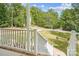 Front porch with white railings and steps leading to a yard at 531 Tributary Dr # 26, Fort Lawn, SC 29714