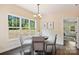 Bright breakfast nook features a round table and chairs, offering a view of the backyard at 531 Tributary Dr # 26, Fort Lawn, SC 29714