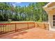 Wooden deck overlooking a backyard with trees and shed at 531 Tributary Dr # 26, Fort Lawn, SC 29714