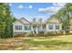 Ranch home with light beige vinyl siding and a large yard at 531 Tributary Dr # 26, Fort Lawn, SC 29714