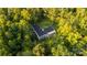 Aerial view of single Gathering home in wooded area at 9224 Maggie Robinson Rd, Waxhaw, NC 28173