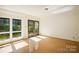 Finished basement room with large windows and doors at 9224 Maggie Robinson Rd, Waxhaw, NC 28173