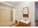 Small bathroom with shower/tub combo, toilet and vanity at 9224 Maggie Robinson Rd, Waxhaw, NC 28173