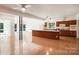 Kitchen with wooden cabinets, island, and modern appliances at 9224 Maggie Robinson Rd, Waxhaw, NC 28173