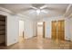 Simple bedroom with built-in shelving and closet at 9224 Maggie Robinson Rd, Waxhaw, NC 28173