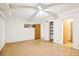 Well-lit bedroom with closet and ceiling fan at 9224 Maggie Robinson Rd, Waxhaw, NC 28173