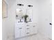 Double vanity bathroom with white cabinets and black fixtures at 615 English St, Monroe, NC 28110