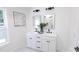 Double vanity bathroom with white cabinets and black fixtures at 615 English St, Monroe, NC 28110