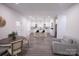 Open concept living and dining space with modern kitchen and stylish decor at 615 English St, Monroe, NC 28110
