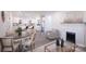Open concept living and dining area with a modern kitchen visible at 615 English St, Monroe, NC 28110