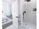 Bathroom with a walk-in shower, toilet and bedroom view at 615 English St, Monroe, NC 28110